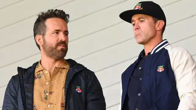 Wrexham co-owners Ryan Reynolds and Rob McElhenney received a warning from club director Shaun Harvey on how to conduct themselves on matchdays.