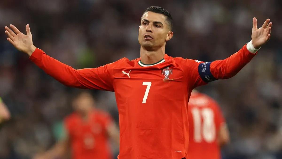 Cristiano Ronaldo was less than impressed when a star-struck fan rushed over to take a selfie with him at Portugal's team hotel.