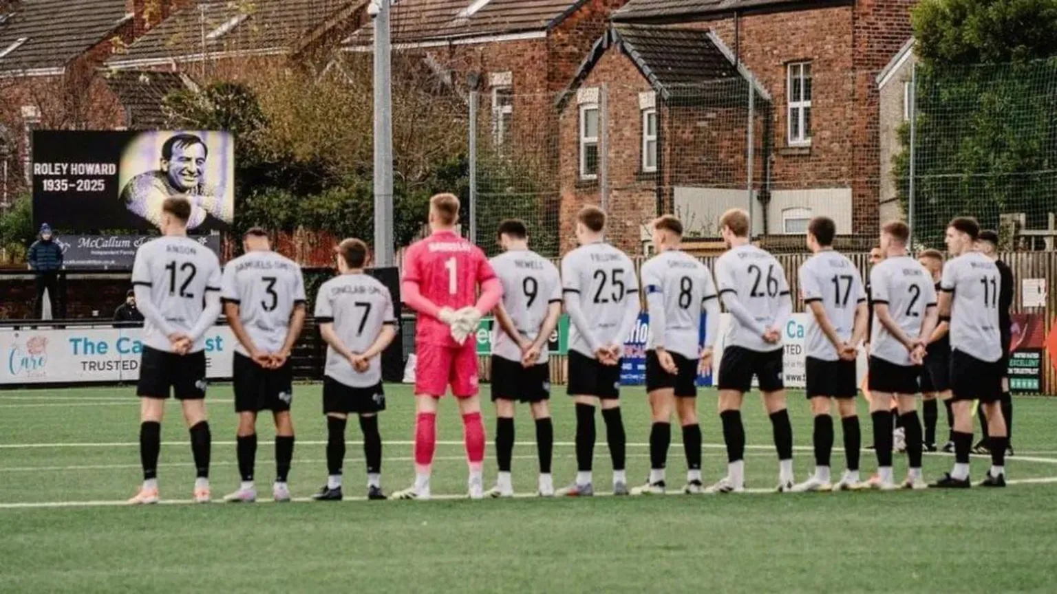 Marine FC players held a minute's silence in tribute to Roly Howard before Saturday's game