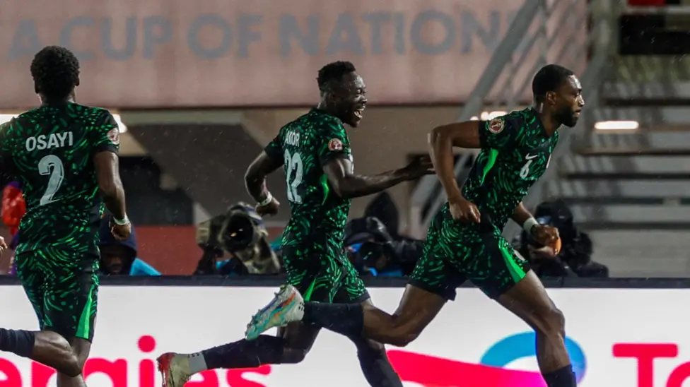 Semi Ajayi (right) opened the scoring for Nigeria in a rainy Fes