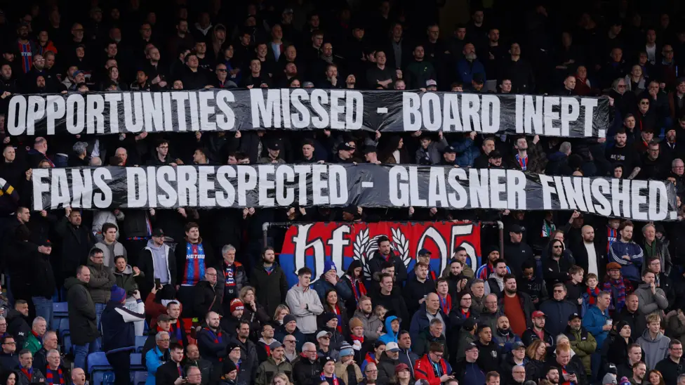Crystal Palace fans displayed banners against Oliver Glasner during the win over Wolves