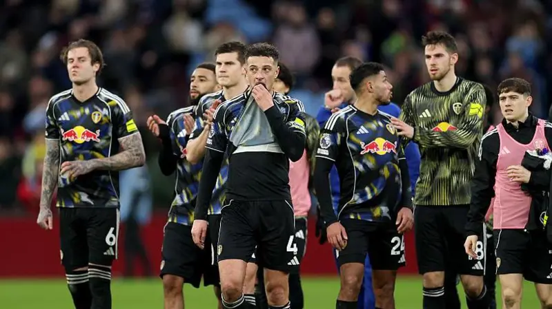 Leeds' players looked dejected after conceding a late equaliser at Aston Villa on Saturday