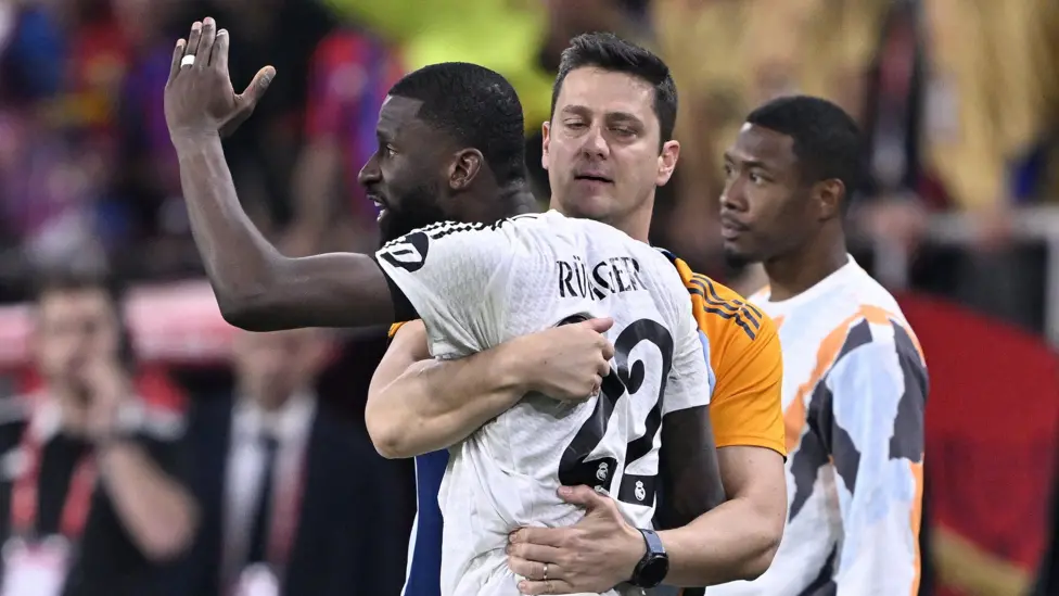 Antonio Rudiger had to be held back by Real coaching staff after being sent off