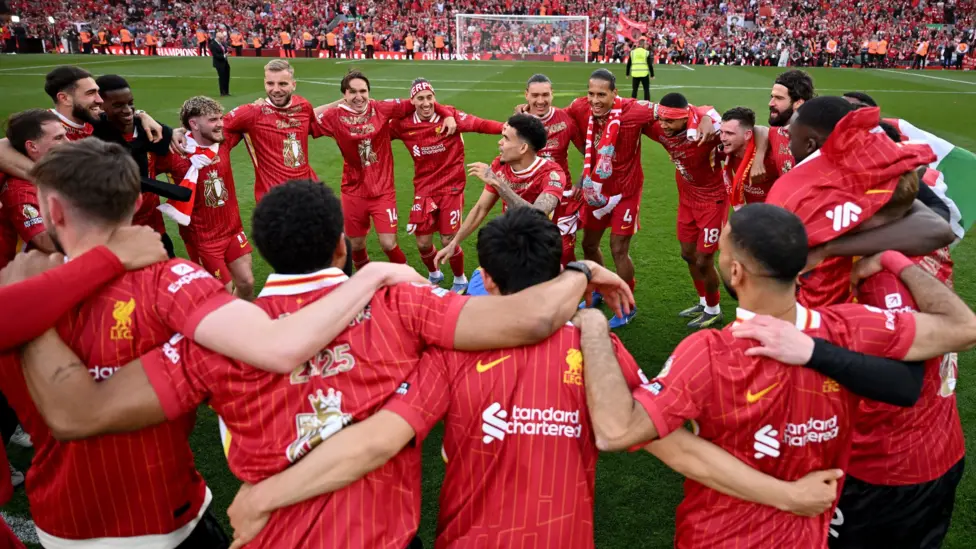 Liverpool's players celebrate clinching the Premier League title