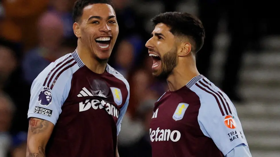 Morgan Rogers celebrates with Marco Asensio after setting up the Spain international's goal in the 3-0 win at Brighton