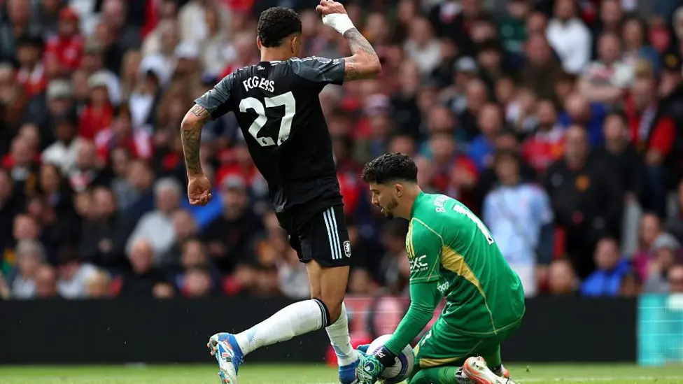 Morgan Rogers challenges Altar Bayindir, with the goal ruled out by on-field referee Thomas Bramall