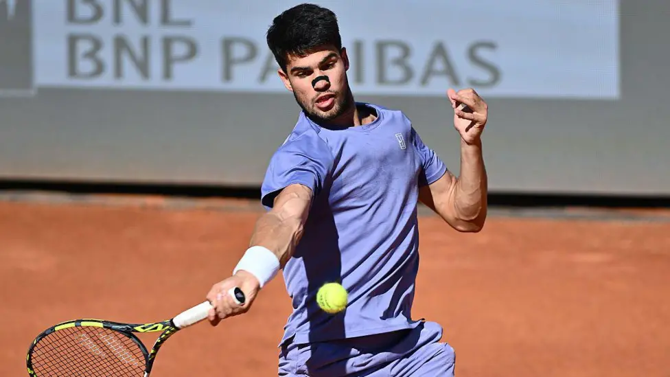 Carlos Alcaraz beat Lorenzo Musetti to prevent an all-Italian final in Rome