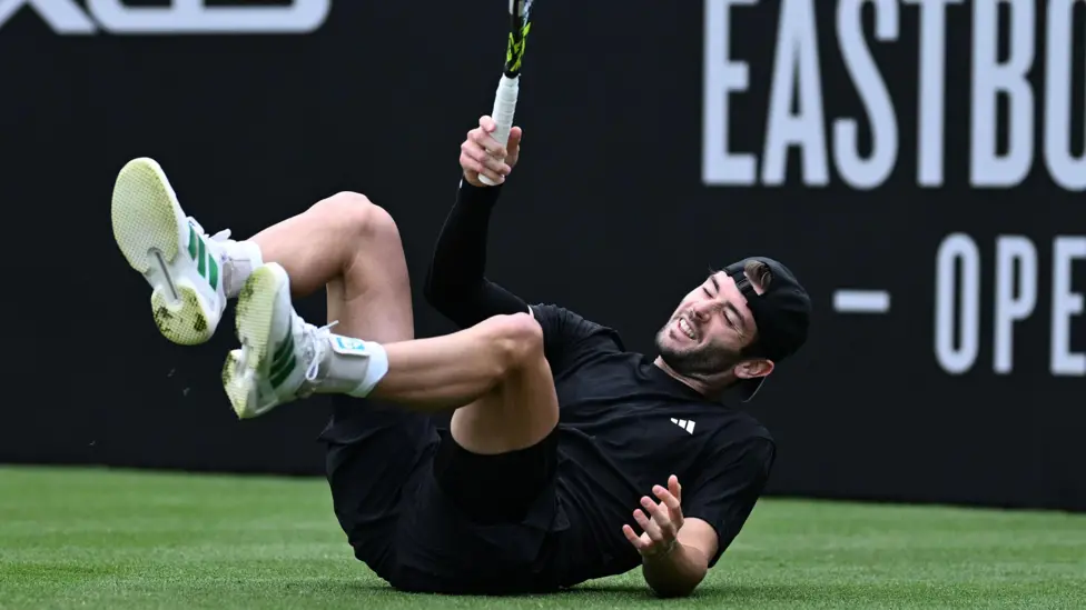 Jacob Fearnley was visibly in pain during the final minutes of his match following a fall