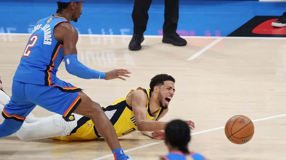 Haliburton had scored nine points before being forced out of Sunday's game