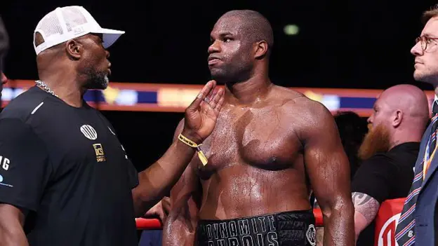 Daniel Dubois - who lost for the third time in 25 fights - with trainer Don Charles