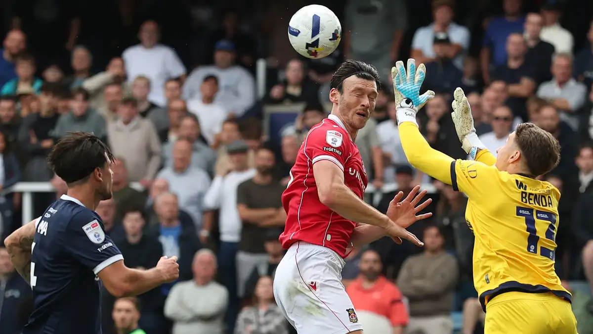 Kieffer Moore scored his third goal in his second consecutive league game, while Lewis O'Brien netted a late winner as Wrexham registered their maiden Championship victory over Millwall.
