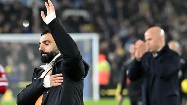 Mohamed Salah waves to Liverpool fans at Elland Road before launching a public attack on head coach Arne Slot and the club.