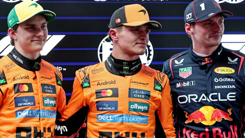 Lando Norris (centre) leads the drivers' championship by 12 points from Red Bull's Max Verstappen (right) and 16 from McLaren team-mate Oscar Piastri