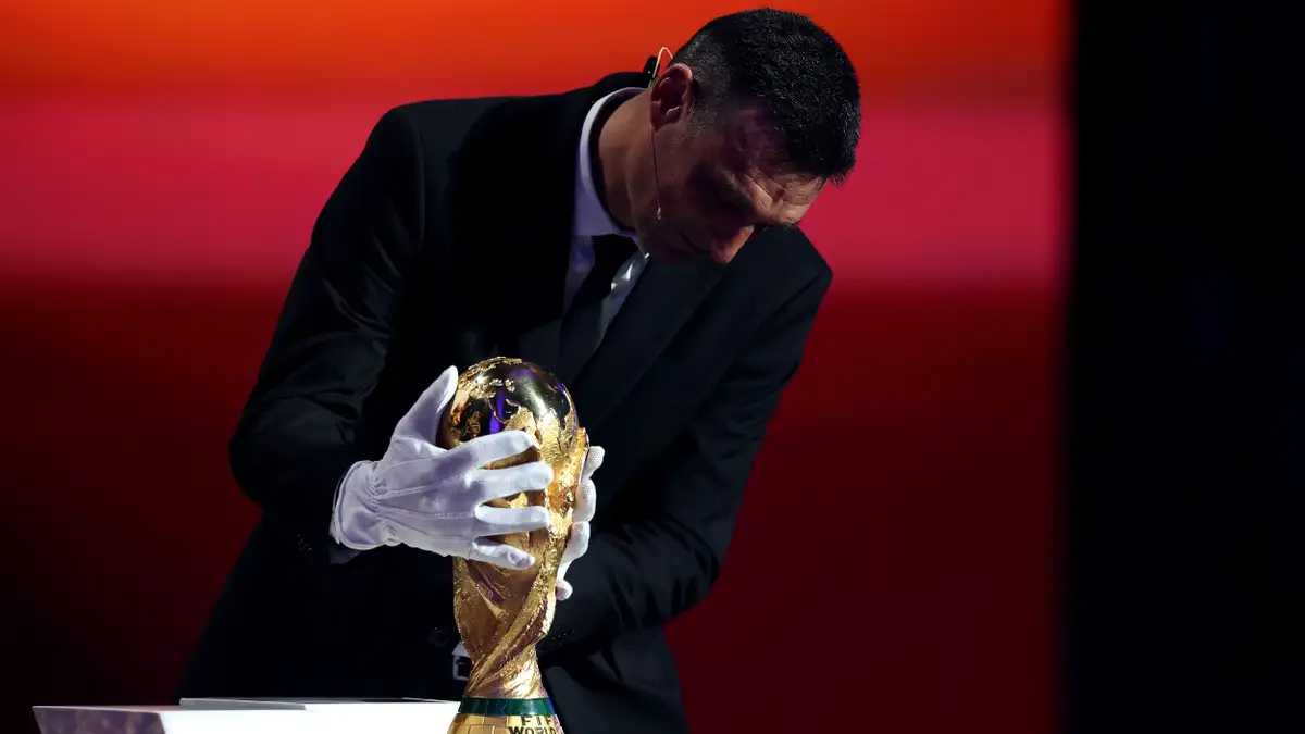 FIFA president Gianni Infantino has apologised to Argentina manager Lionel Scaloni after a bizarre mix-up at the 2026 World Cup draw forced the reigning world champion coach to wear gloves before touching the trophy. The incident caused confusion and frustration, prompting FIFA to stage a corrective ceremony the next day to make amends publicly.