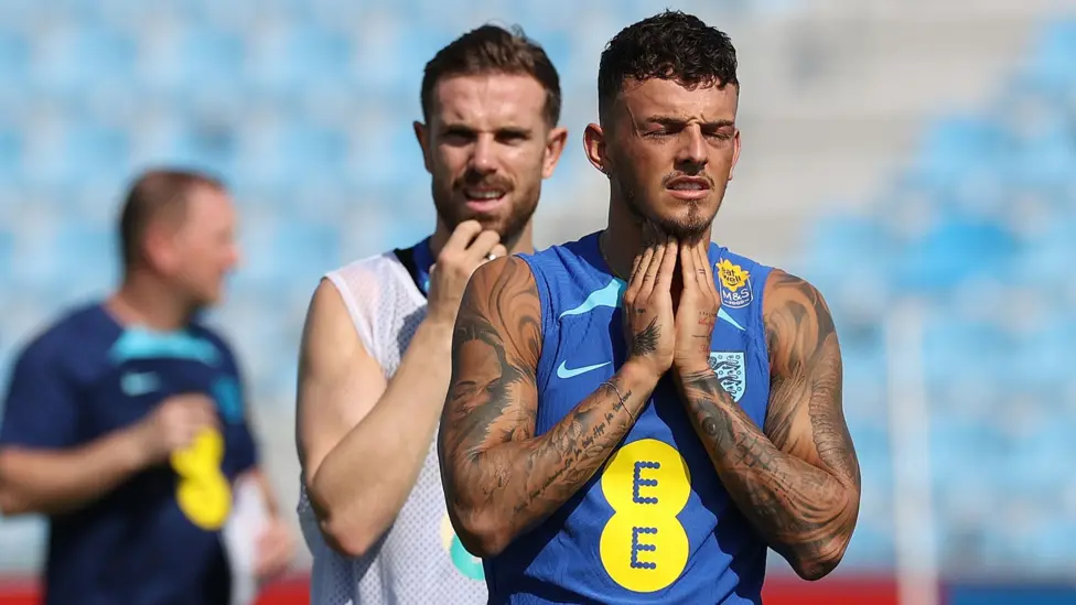 Ben White, pictured with England team-mate Jordan Henderson training at the 2022 World Cup, was an unused substitute for two games at Qatar before leaving the squad