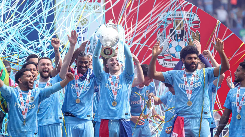 Coventry players lifted the Championship trophy after beating Wrexham