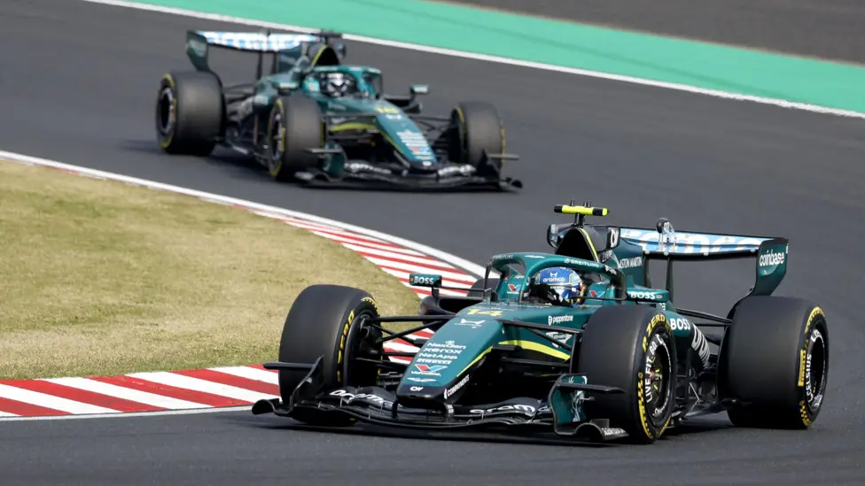 Fernando Alonso (right) finished 18th in the Japanese Grand Prix, ahead of Cadillac's Valtteri Bottas and Williams' Alex Albon. Lance Stroll failed to finish the race
