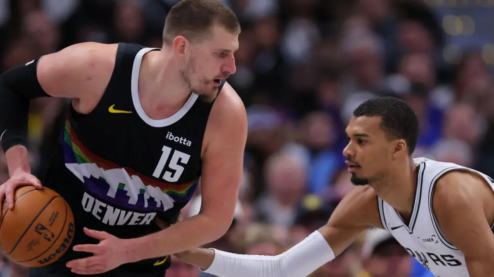 Nikola Jokic (left) was named NBA MVP in 2021, 2022 and 2024