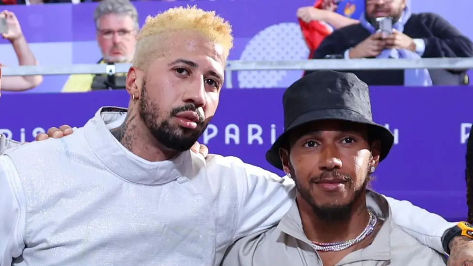 Miles Chalmley-Watson and Lewis Hamilton at the 2024 Paris Olympic Games fencing event