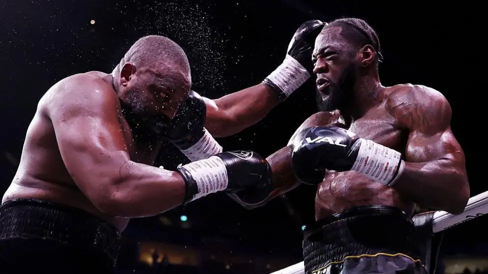 Deontay Wilder (right) beat Derek Chisora on a split decision

