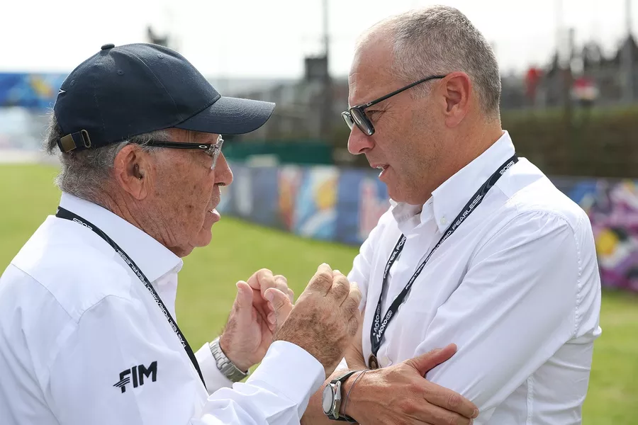Stefano Domenicali of Italy and CEO of Formula 1 and Carmelo Ezpeleta of Spain and CEO of Dorna Sports
