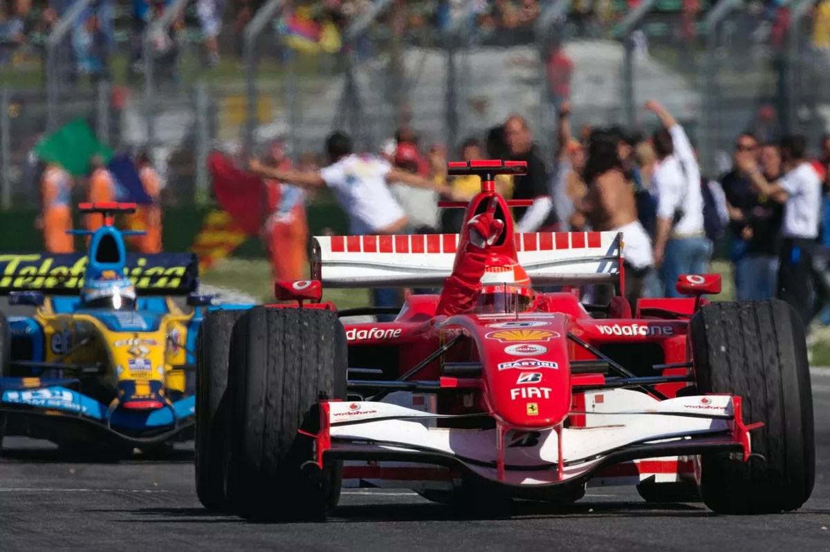 One year on from their famous duel, Michael Schumacher and Fernando Alonso battled for victory again in Imola in 2006 – but the hunter was now the hunted